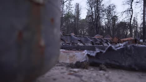 Slider-reveal-of-wildfire-burned-house-in-residential-neighborhhod-of-Paradise,-California