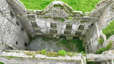 irish castles dramatic drone view of ruined leamenah castle co.clare ireland epic locations and landscapes