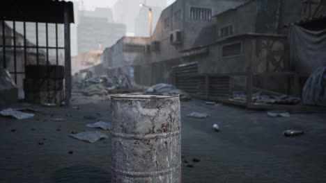 a desolate urban cityscape with abandoned buildings, trash, and a rusty barrel in the foreground