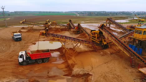 view from above mining conveyor working on sand mine. mining equipment