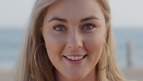 portrait beautiful blonde woman smiling outdoors at seaside happy lifestyle