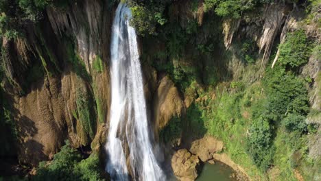 close up drone shot of thi lo su waterfall, off the beaten track in the jungle of north thailand in the area of umphang in se asia