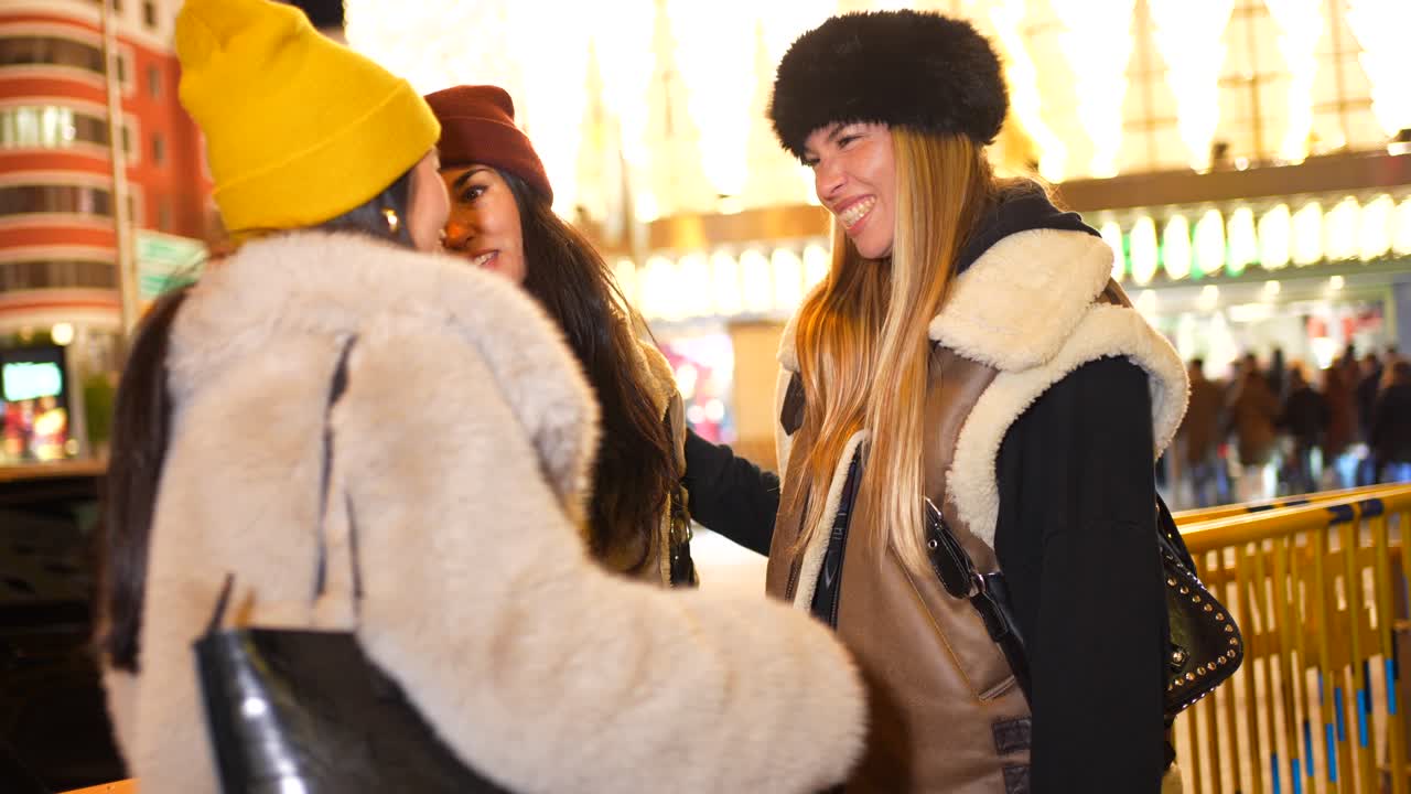 Friends Hugging in the City at Night