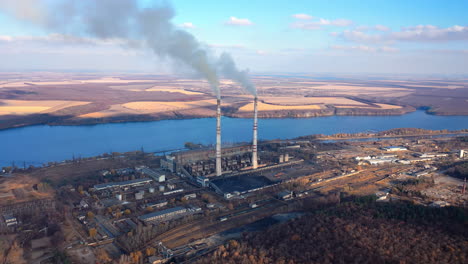 white smoke from the chimney. smoke from the pipe of the metallurgical plant