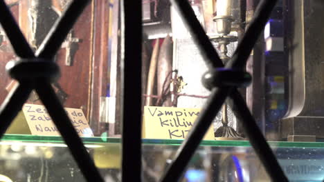 close up of shop window selling vampire killing kit in warsaw old town 4k