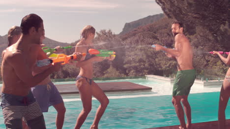 happy friends playing with swimming trunks