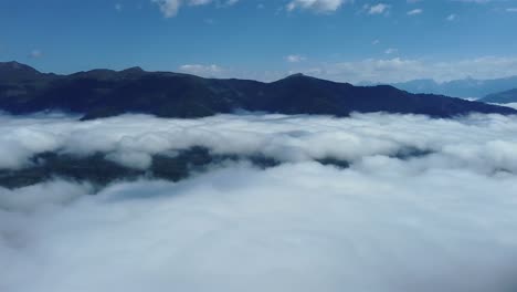 Dense-clouds-in-the-early-morning-light-in-the-Alps-of-Austria