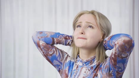 Unhappy-and-worried-young-woman-becomes-uneasy-and-stressed.