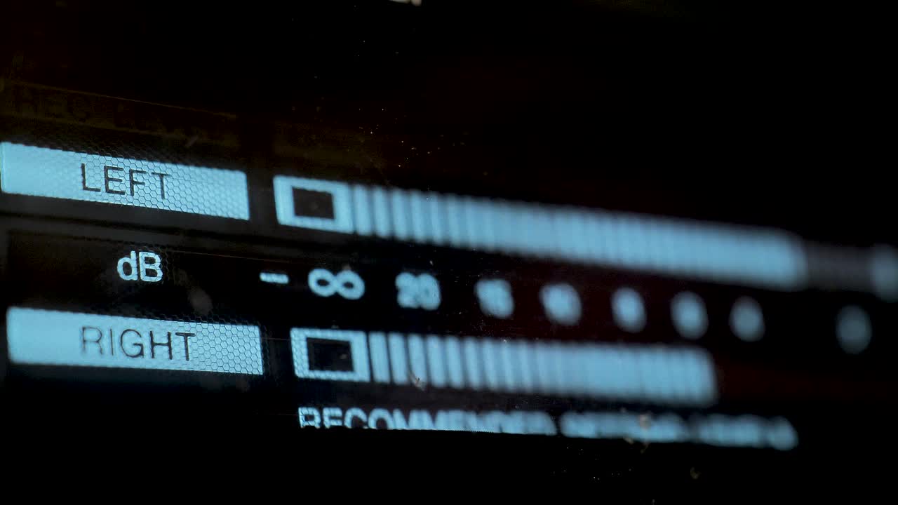 Audio signal levels monitoring audio console on classic sound amplifier. Led Vu Meter Vintage Macro. Scene A.