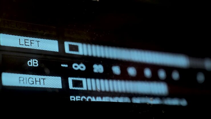 Audio signal levels monitoring audio console on classic sound amplifier. Led Vu Meter Vintage Macro. Scene A.