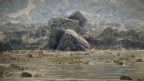 rocky landscape with mountain in background