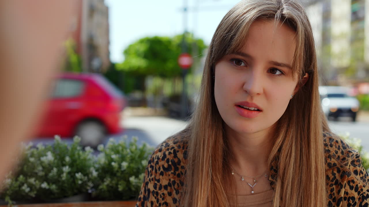 Woman in outdoor cafe