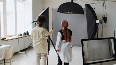 photographer taking pictures in studio