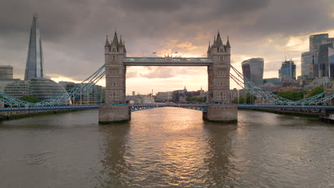 tower bridge and london skyline at sunset over the river thames