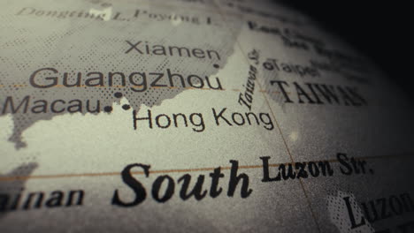 close-up view of a world globe focusing on the asia region