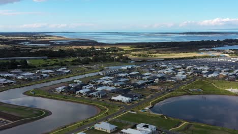 aerial over new housing real estate on australian coastline, point lonsdale