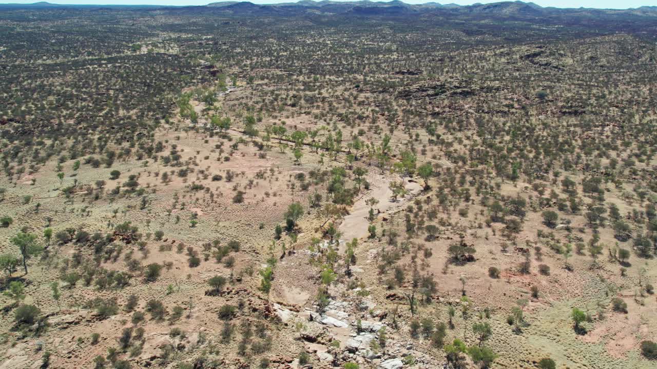 Drone footage of the dry Tood River upstream of the Telegraph Station, north of Alice Springs, Mparntwe, Northern Territory, Australia. August 2022.