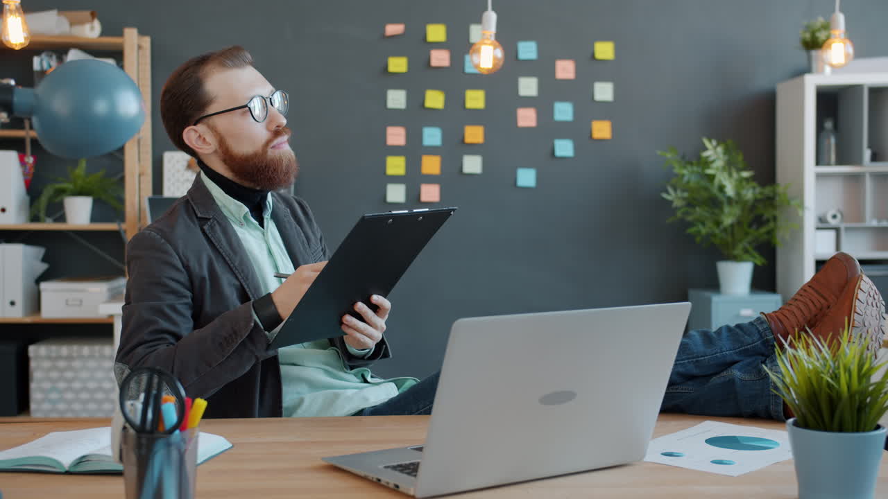 Businessman Relaxing at His Desk
