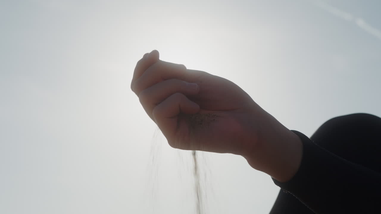 Surfer man walking to the beach at sunset preparing for surfing training and search for waves in Barcelona, spain, water, ocean exercise in sea with board, athletic male holiday or travel in vacation