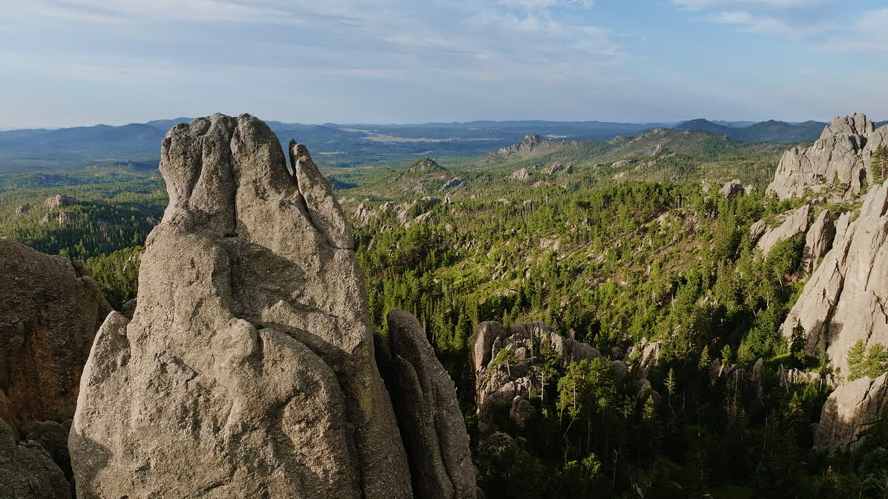 Drone footage capturing stunning rock formations shaped by time in the western U.S. landscape.
