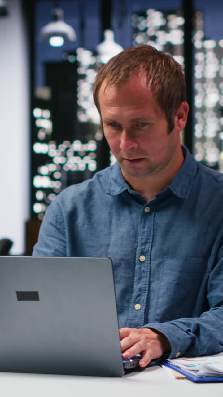 Vertical Video Multiethnic business workers projecting numbers for market research