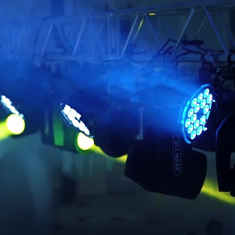spotlights on stage with smoke