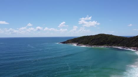 Flying-towards-a-peninsula-over-the-ocean