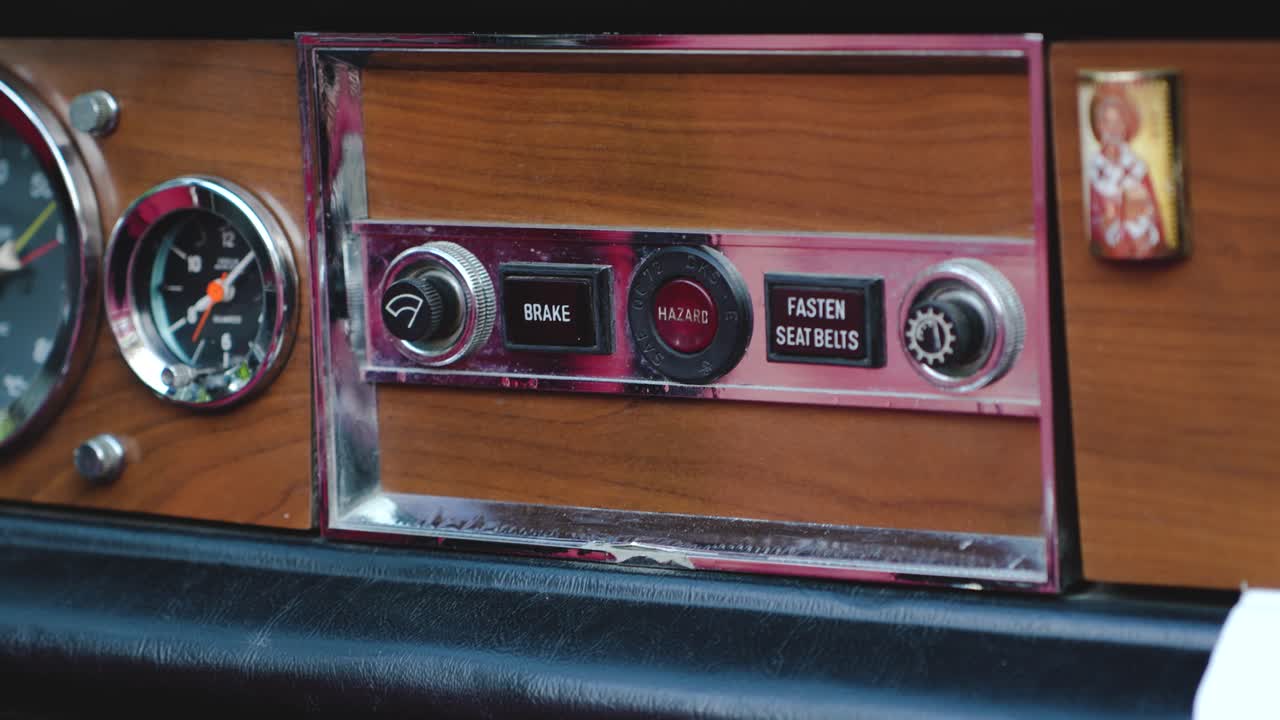 Antique vehicle dashboard with authentic speedometer and elegant classic design. Ideal for heritage exhibitions, documentaries, and collectible car showcases