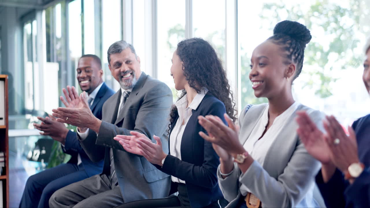 Happy business people, applause