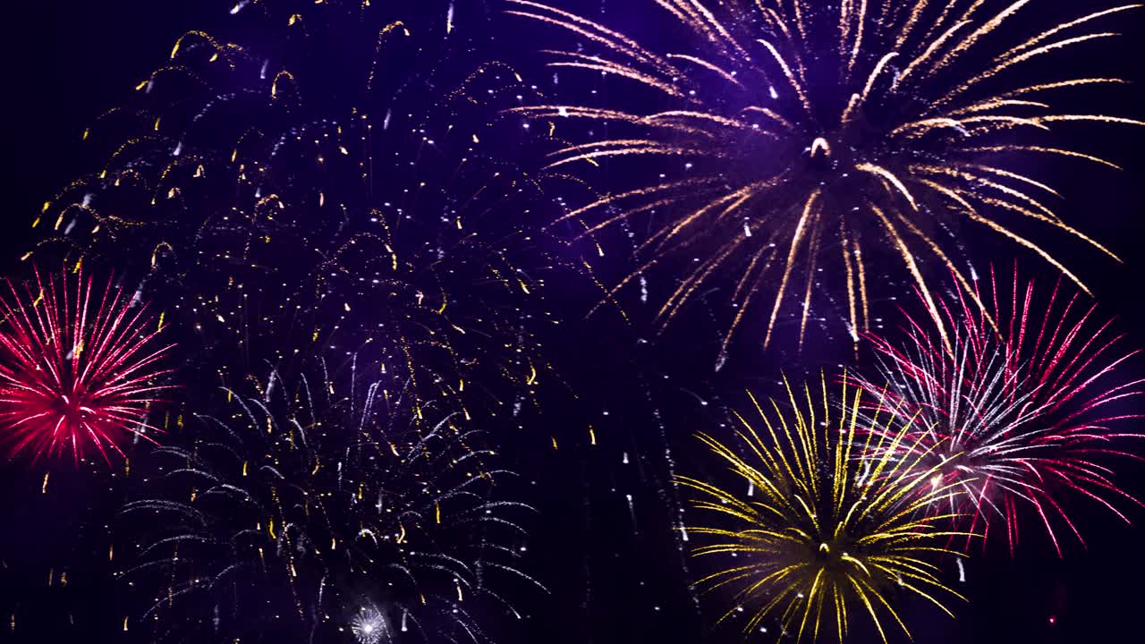 Abstract shiny fireworks bokeh lights in the night sky firework show birthday anniversary