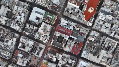 top down aerial view of montevideo uruguay downtown neighborhood, buildings and streets 60fps