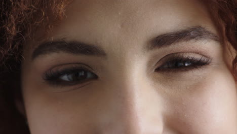 close up of young woman eyes looking at camera awkward cute expression