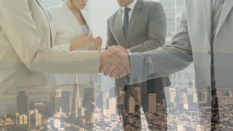 handshake with city in background