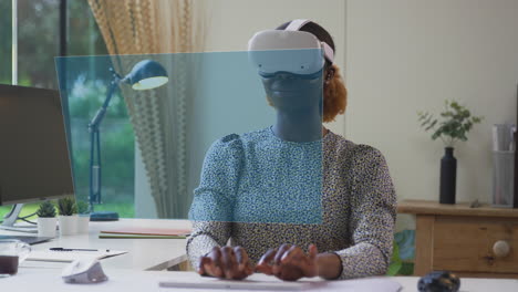 Woman-Looking-At-Projected-Screen-Sitting-At-Desk-Wearing-VR-Headset-Typing-On-Keyboard