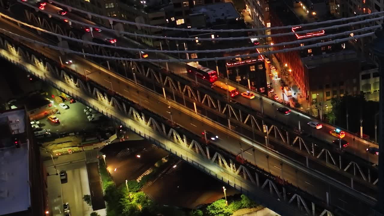 Night view of Brooklyn Bridge with traffic in New York City