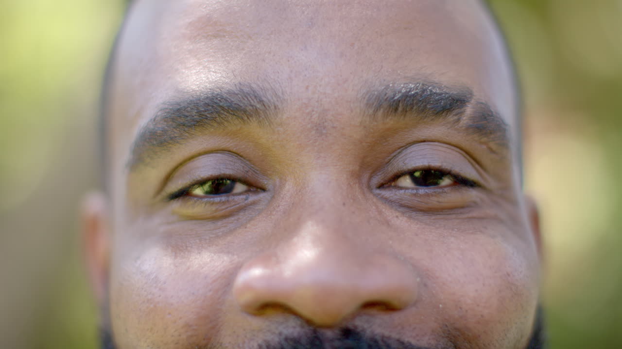 Close-up of man's eyes and face, focusing on expression and detail