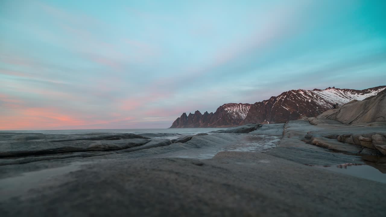 Dramatic coastal timelapse at Tungeneset, Senja, with rugged mountains and sky reflections