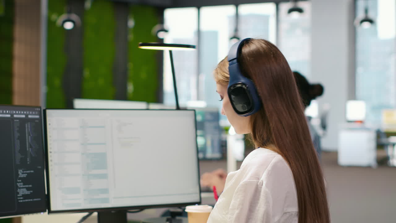 Engineer Coding With Ai Language Model Assistance In Office, Listening Music