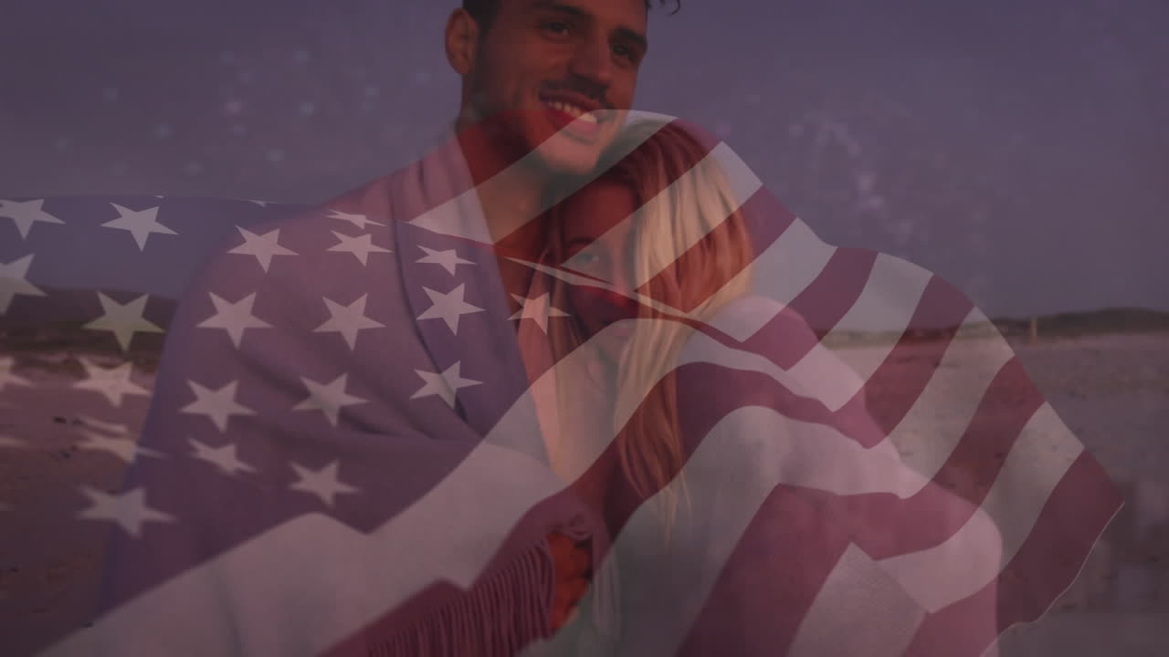 animación de la bandera de los estados unidos de américa sobre una pareja caucásica en la playa