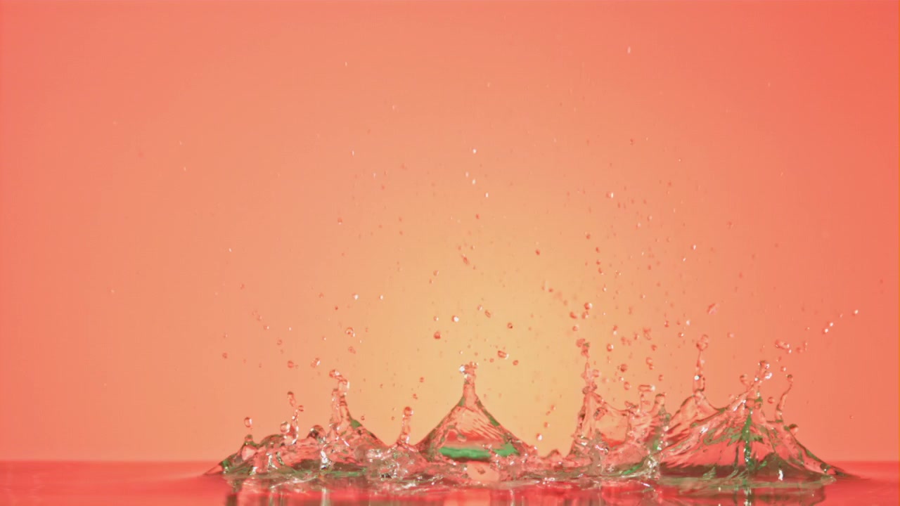 Slow Motion Red Chili Pepper Splashing into Water
