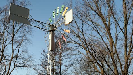 wind vane spinning in the wind. windmill