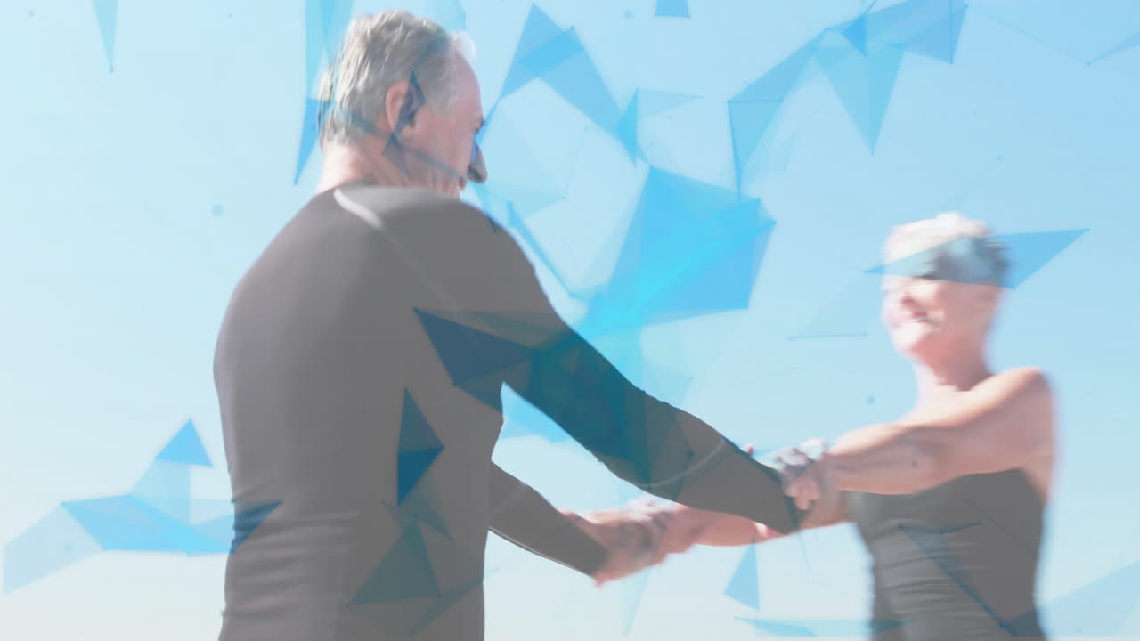 Dancing joyfully, elderly couple with blue geometric shapes overlay in animation