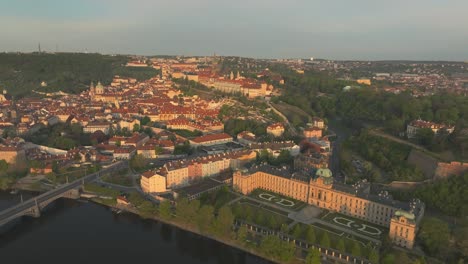 stunning sunset light on the city of prague and the zahrada strakovy akademie in the czech republic, slow motion and copy space