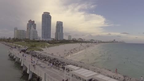 aerial over miami florida with beaches and skyscrapers
