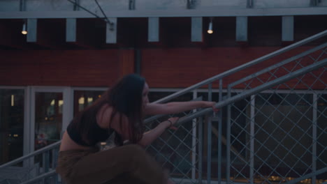 young, female, contemporary dancer on scenic overlook at sunset