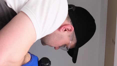 man wearing a cap and glasses