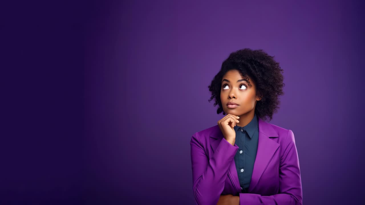 A thoughtful woman in a purple suit gazes upward against a matching backdrop