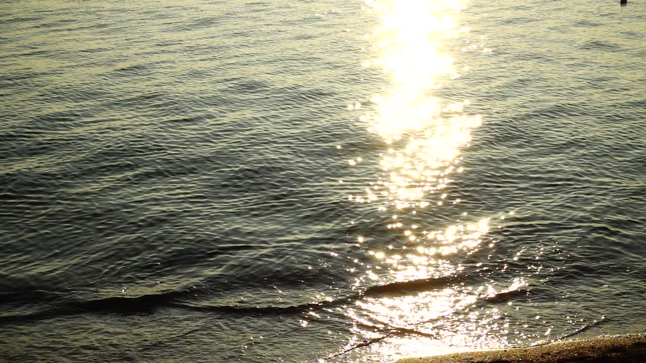 Beam of the sun at sunset. Slow motion