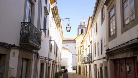 Woman-in-Castelo-de-Vide-street,-in-Portugal