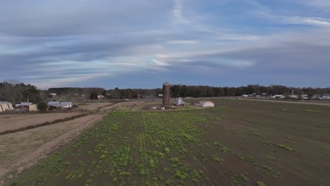 aerial approach of silo on farmland in alabama